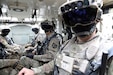 Soldiers don the Integrated Visual Augmentation System Capability Set 3 hardware while mounted in a Stryker in Joint Base Lewis-McCord, WA.