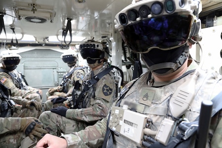 Soldiers don the Integrated Visual Augmentation System Capability Set 3 hardware while mounted in a Stryker in Joint Base Lewis-McCord, WA.
