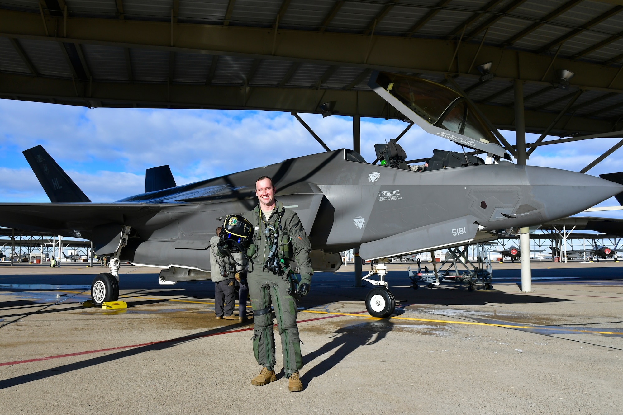 Maj. Daniel Toftness, an Air Force Reserve pilot in the 419th Fighter Wing at Hill Air Force Base, Utah, poses for a photo before for a flight Feb. 18 when he will reach 1,000 flying hours in the F-3A5 Lightning II.