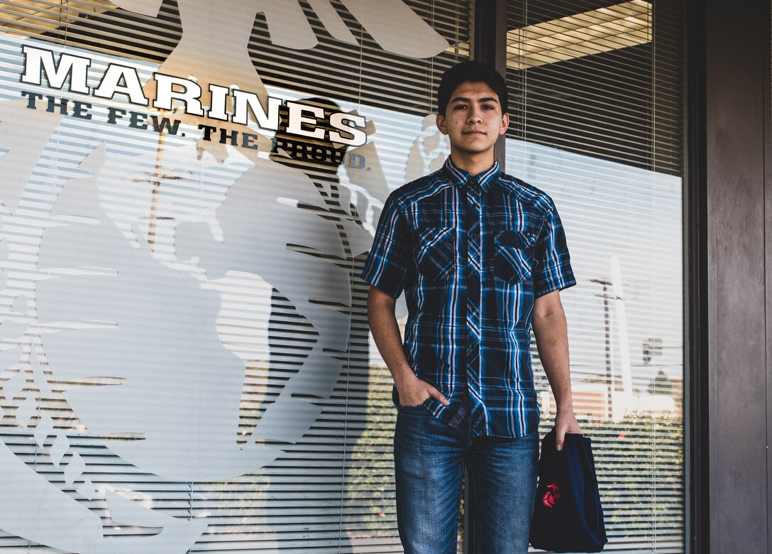 Future Marine Christian Ponce, a poolee with Recruiting Sub-Station Santa Ana, Recruiting Station Orange County, poses for a photo in Santa Ana, California on Feb. 12, 2021. Ponce received a meritorious promotion to private first class for providing two referrals to his recruiter. Referrals are necessary to identify qualified applicants for potential service in the Marine Corps. As a future Marine, their first mission is to identify potential leads for their Recruiter in order to continue filling the ranks with our Nation's best and brightest. (U.S. Marine Corps photo by Sgt. Sarah Ralph)