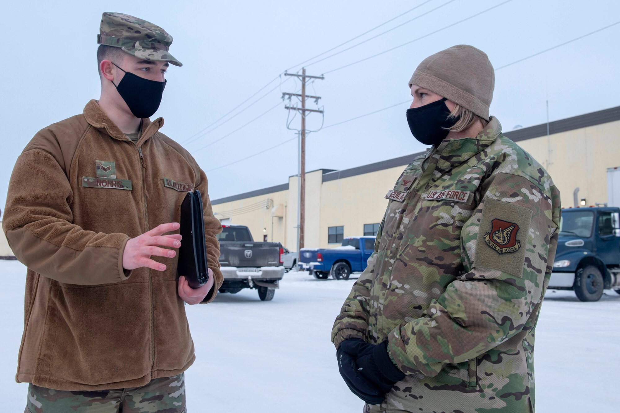 U.S. Air Force Senior Airman Tyler Norris, a contract specialist assigned to the 673d Contracting Squadron, briefs on the process of choosing a contractor to U.S. Air Force Col. Kirsten Aguilar, Joint Base Elmendorf-Richardson and 673d Air Base Wing commander, during an immersion tour at JBER, Alaska, Feb. 5, 2021. Aguilar familiarized herself with the 673d CONS and its role in supporting the installation’s mission readiness after taking command of the installation July 14, 2020. The 673d CONS provides acquisition support for units across the installation by managing the purchase of supplies, services and construction.
