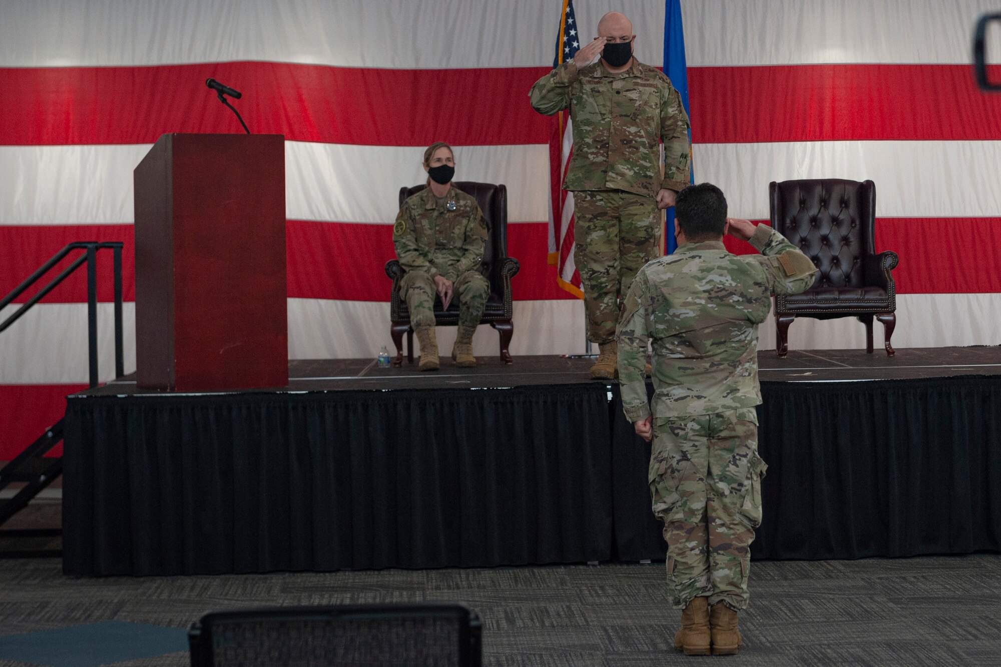 Photo of an Airman saluting the new 23d HCOS commander