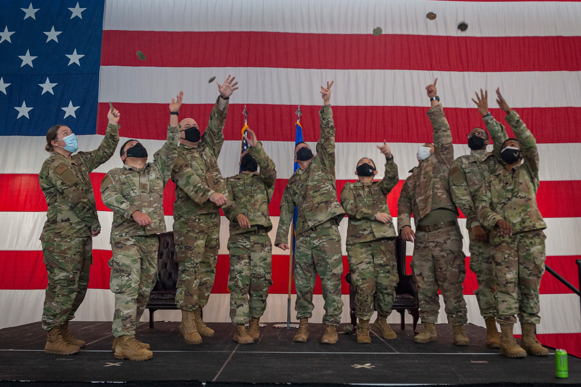 Photo of Airmen throwing patches