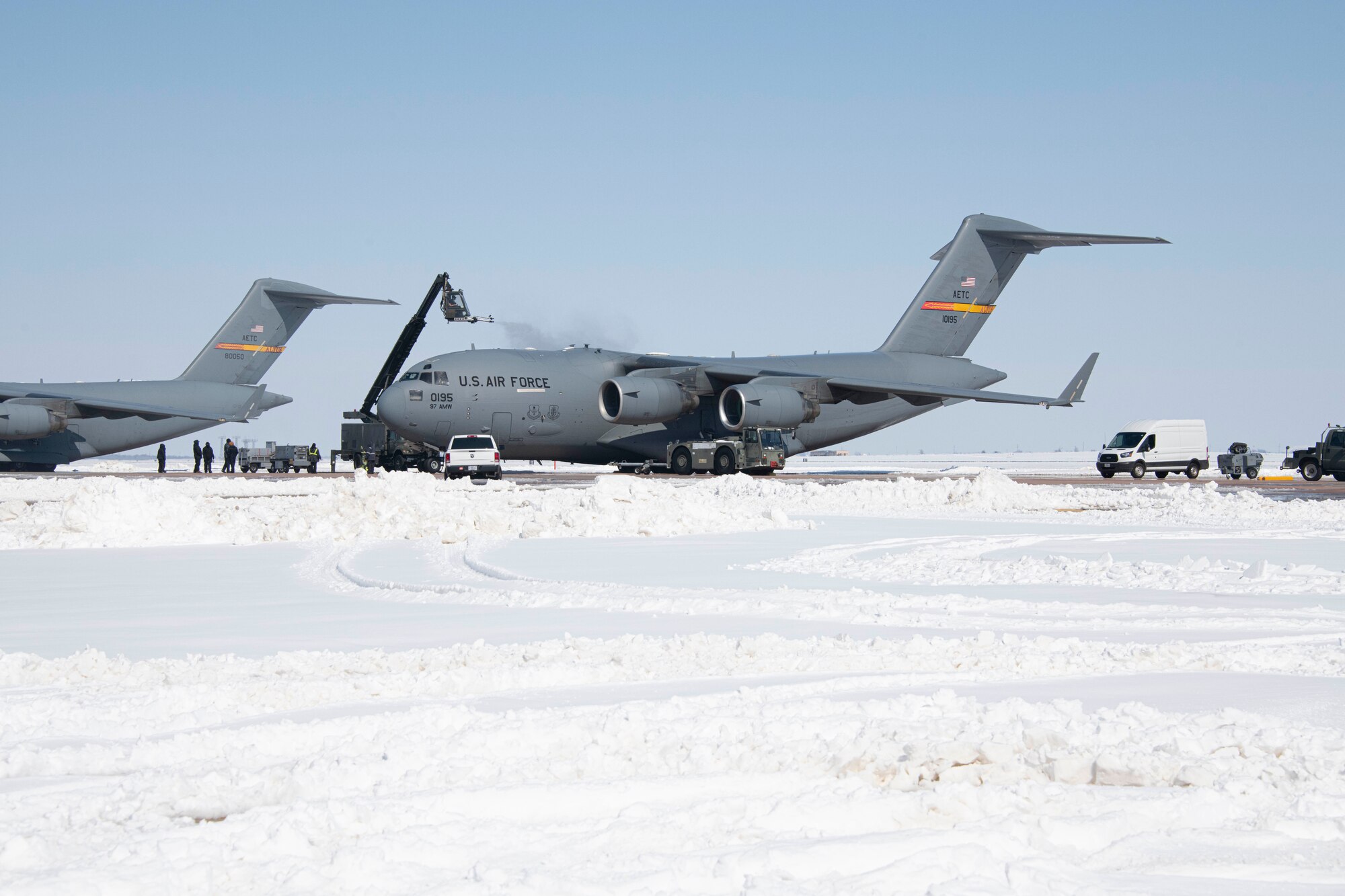 people gather around aircraft