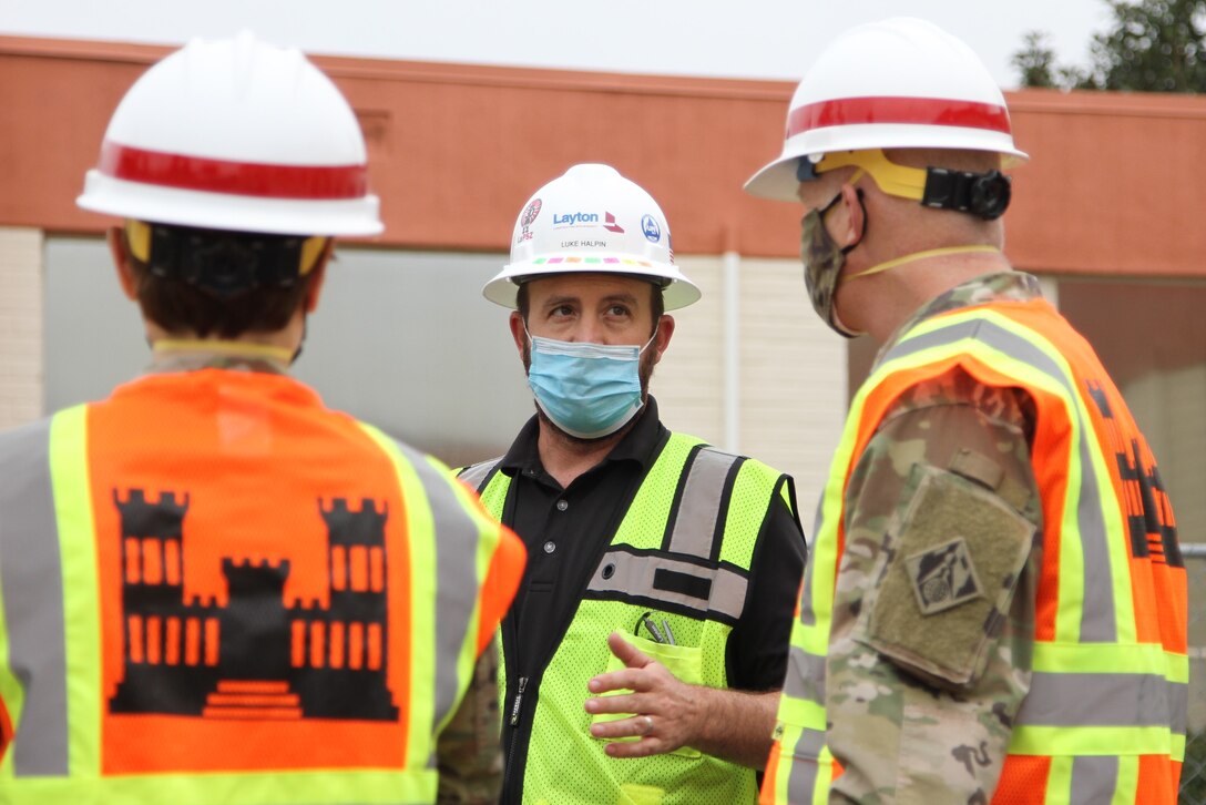 Luke Halpin, construction manager with Layton Construction Company, center, talks with Brig. Gen. Paul Owen, U.S. Army Corps of Engineers South Pacific Division commander, right, during Owen’s Feb. 9 visit to Beverly Community Hospital in Montebello, California, to see construction progress there, including upgrades to a 17-bed wing in the facility for non-COVID patients and the conversion of a pre-operation waiting room to a COVID staging area through the addition of high-flow oxygen. At left is Col. Julie Balten, Los Angeles District commander.