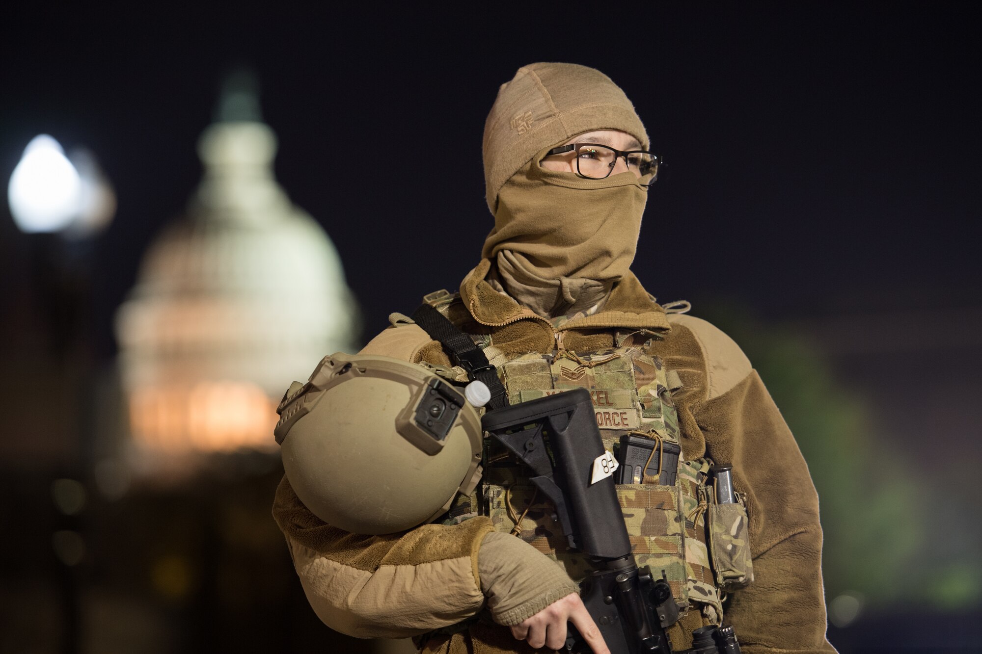 A security forces Airman stands guard at the U.S. Capitol Building in Washington D.C.