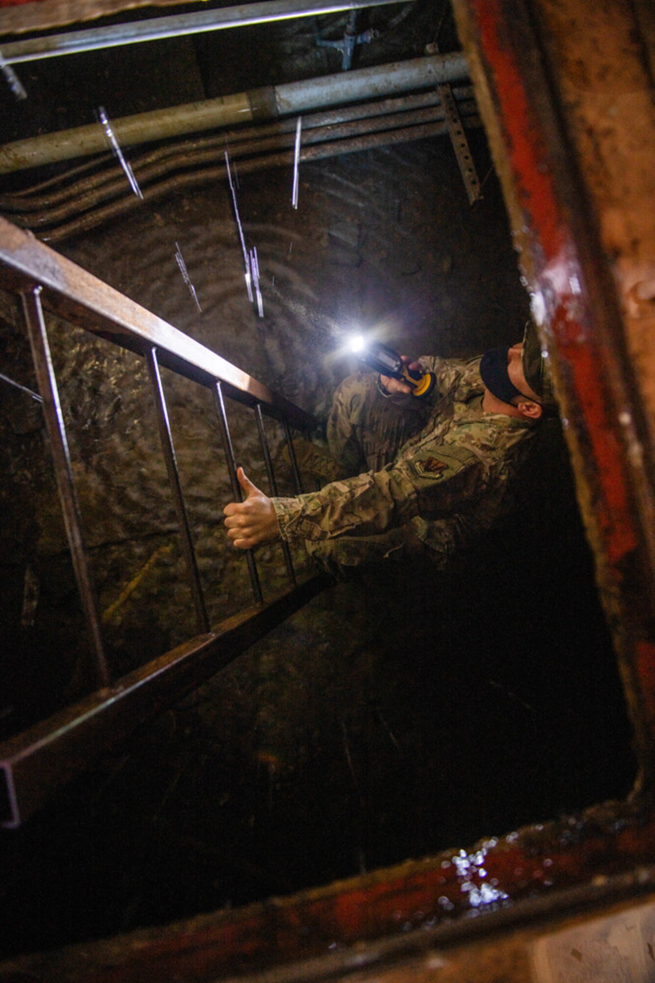 U.S. Air Force Master Sgt. Derek Hunter, 668th Alteration and Installation Squadron heating, ventilation, and air condition technician, reports damages caused by the severe winter storm lasting over five days, Feb. 19, 2021, at Joint Base San Antonio-Lackland, Texas.