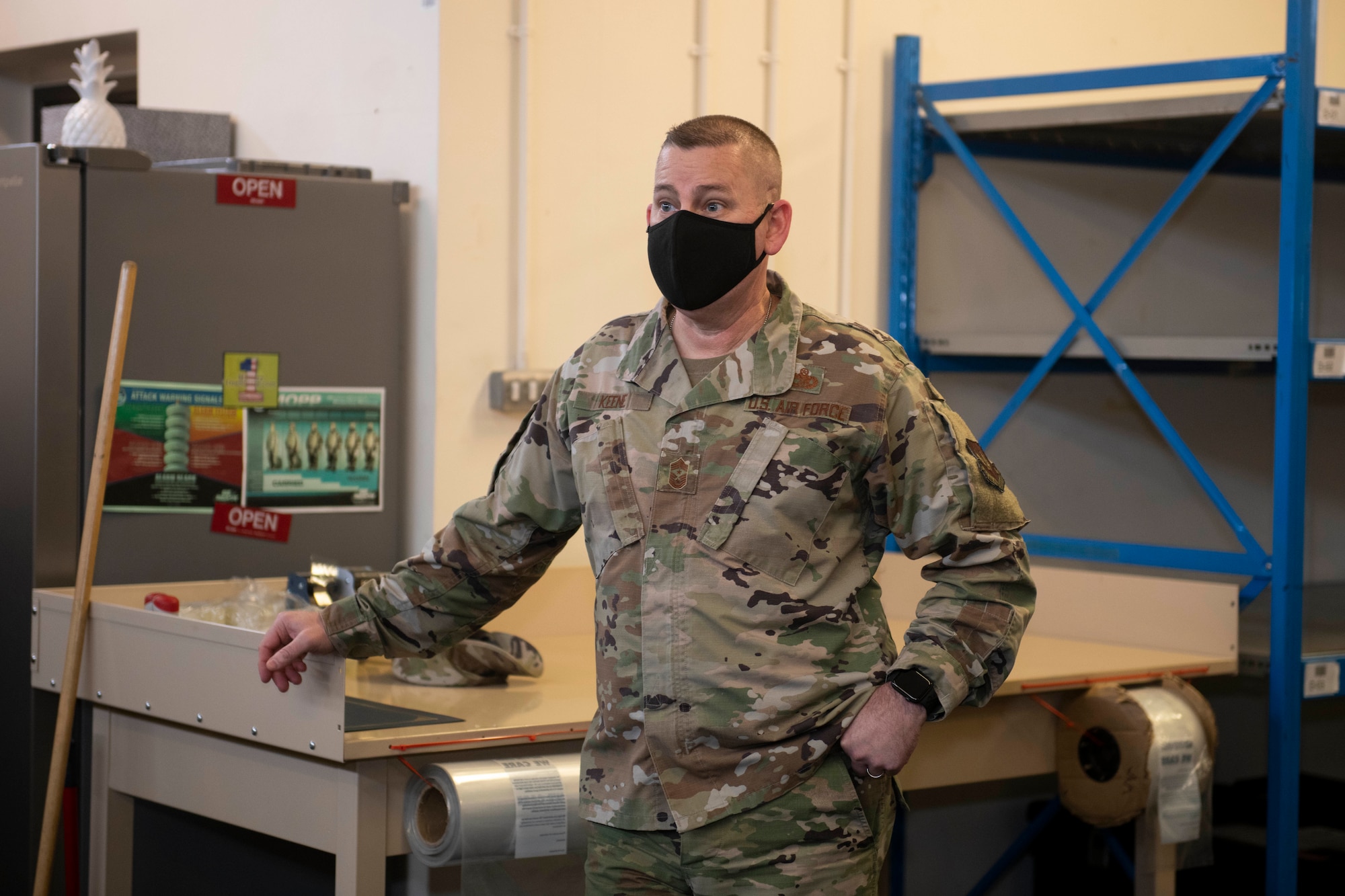 U.S. Air Force Chief Master Sgt. Daniel Keene, 501st Combat Support Wing command chief, congratulates Airman 1st Class Isaiah McGriff, 423rd Force Support Squadron postal directory clerk, for being selected as January’s Pathfinder Grit Award, at Royal Air Force Alconbury, England, Feb. 19, 2021. McGriff received the award for his high performance as a postal directory clerk, as well as the additional duties of being a voting representative for the RAF Alconbury and RAF Molesworth Post Offices. McGriff led the Secretary of Defense’s high visibility program by processing over 1,000 absentee ballots, which ensured members the right to vote in the 2020 Presidential Election. (U.S. Air Force photo by Senior Airman Jennifer Zima)