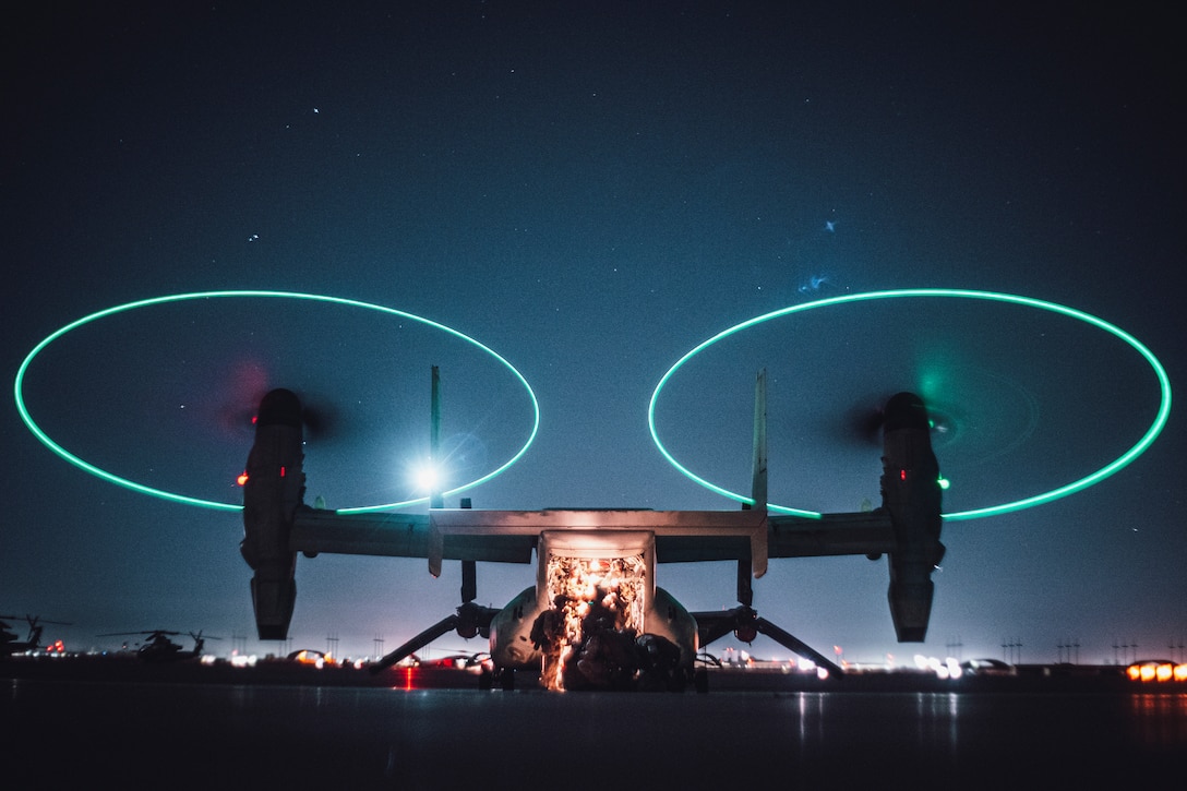 U.S. Marines load into an MV-22 Osprey to conduct a reconnaissance and surveillance mission insertion during Realistic Urban Training exercise at Marine Corps Air Station Yuma, Arizona, Feb. 19.