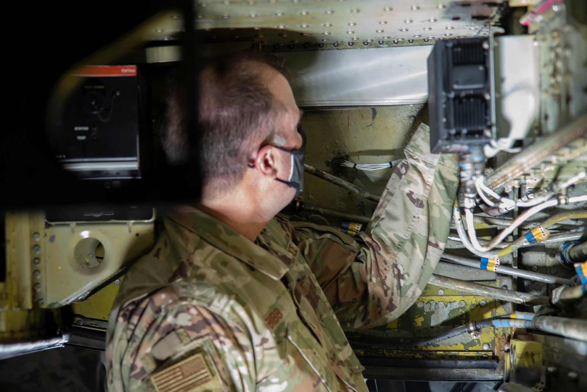 U.S. Air Force Maj. Gen. Thad Bibb Jr., 18th Air Force commander inspects the landing gear on a KC-135 Stratotanker aircraft Feb. 18, 2021, at MacDill Air Force Base, Fla.