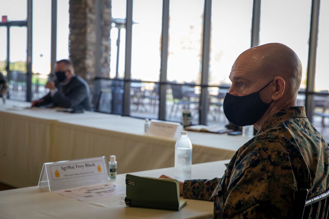 The 19th Sergeant Major of the Marine Corps, Sgt. Maj. Troy E. Black, speaks with Marine and Family Program specialists at Camp Pendleton, Ca, Feb. 11, 2021. The Sergeant Major of the Marine Corps conducted the visit to address some of the changes happening to the Transition Readiness Seminar available to Marines, especially the changes implemented in response to COVID-19. Marine and Family programs assist and guide service members and their families in the development and attainment of their personal and professional goals during military service and beyond. (U.S. Marine Corps photo by Sgt. Victoria Ross)