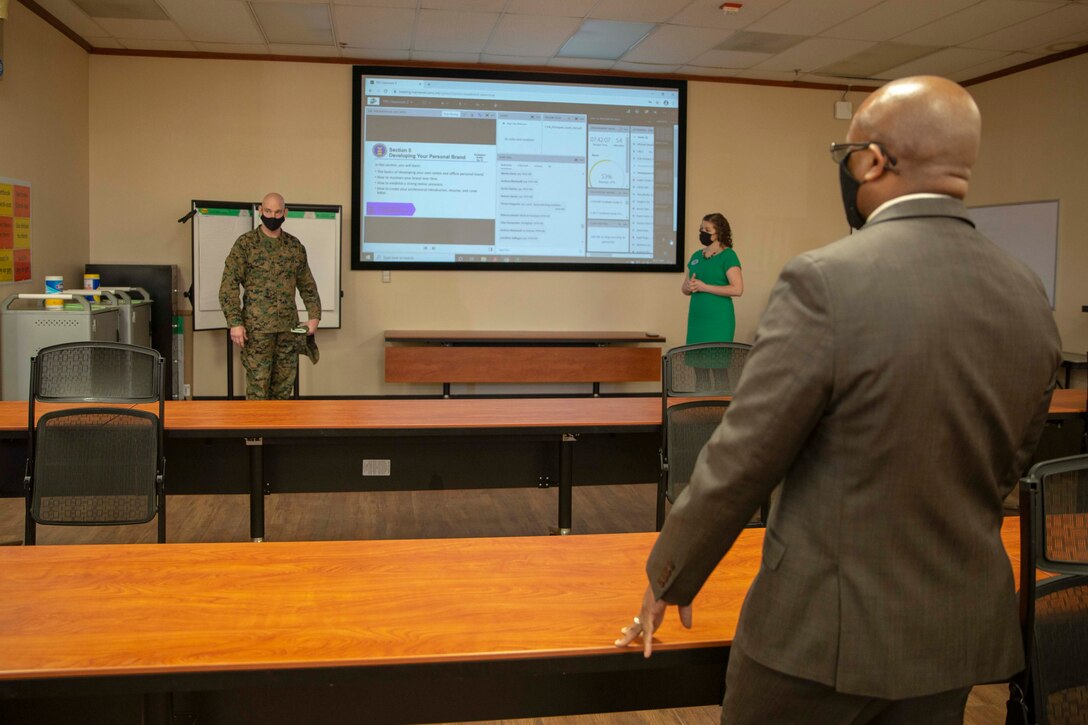 The 19th Sergeant Major of the Marine Corps, Sgt. Maj. Troy E. Black, speaks with Marine and Family Program specialists at Camp Pendleton, Ca, Feb. 11, 2021. The Sergeant Major of the Marine Corps conducted the visit to address some of the changes happening to the Transition Readiness Seminar available to Marines, especially the changes implemented in response to COVID-19. Marine and Family programs assist and guide service members and their families in the development and attainment of their personal and professional goals during military service and beyond. (U.S. Marine Corps photo by Sgt. Victoria Ross)