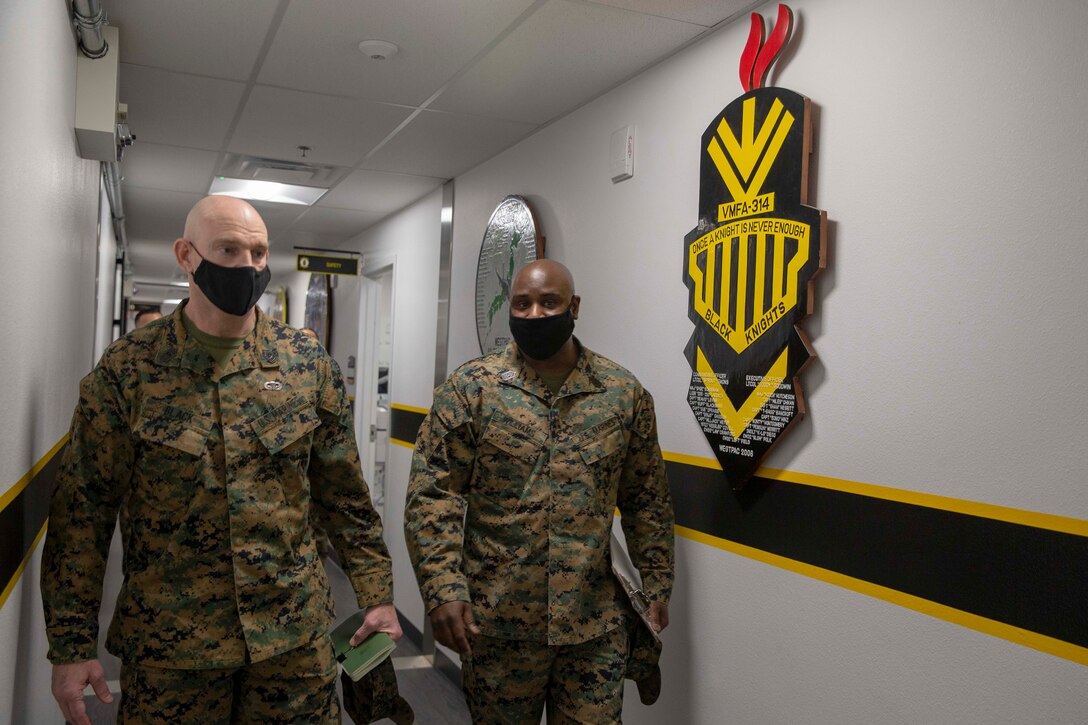The 19th Sergeant Major of the Marine Corps, Sgt. Maj. Troy E. Black, tours VMFA-314, 3rd Marine Aircraft Wing (MAW) at Marine Corps Air Station Miramar, San Diego, Ca, Feb. 11, 2021. The Sergeant Major of the Marine Corps conducted the visit to speak to Marines, especially those that work on the newest Marine aviation platform, the F-35.  Marine Aircraft Group 11 generates, embarks, and integrates relevant, combat ready aviation forces capable of providing Offensive Air Support, Anti-Aircraft Warfare, Assault Support, Aerial Reconnaissance, and terminal area Control of Aircraft. (U.S. Marine Corps photo by Sgt. Victoria Ross)