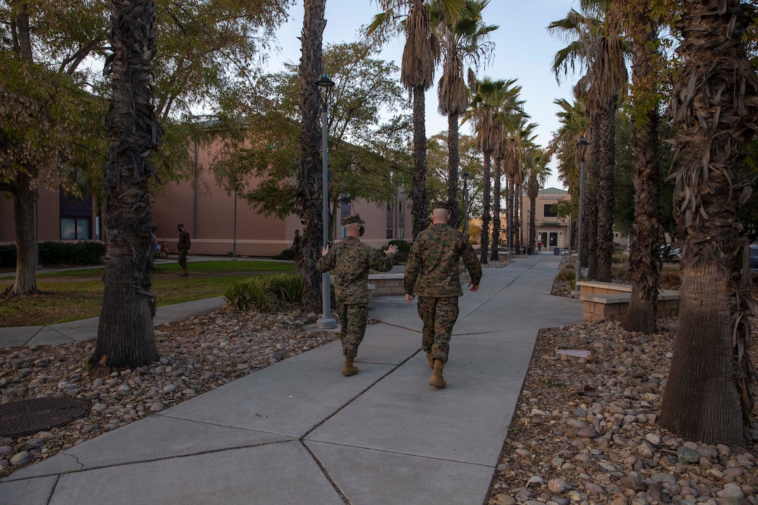 The 19th Sergeant Major of the Marine Corps, Sgt. Maj. Troy E. Black, tours barracks at Marine Corps Air Station (MCAS) Miramar, San Diego, Ca, Feb. 11, 2021. The Sergeant Major of the Marine Corps conducted the visit to review efforts to renew housing available to single Marines stationed at MCAS Miramar.  Marine Aircraft Group 11 generates, embarks, and integrates relevant, combat ready aviation forces capable of providing Offensive Air Support, Anti-Aircraft Warfare, Assault Support, Aerial Reconnaissance, and terminal area Control of Aircraft. (U.S. Marine Corps photo by Sgt. Victoria Ross)