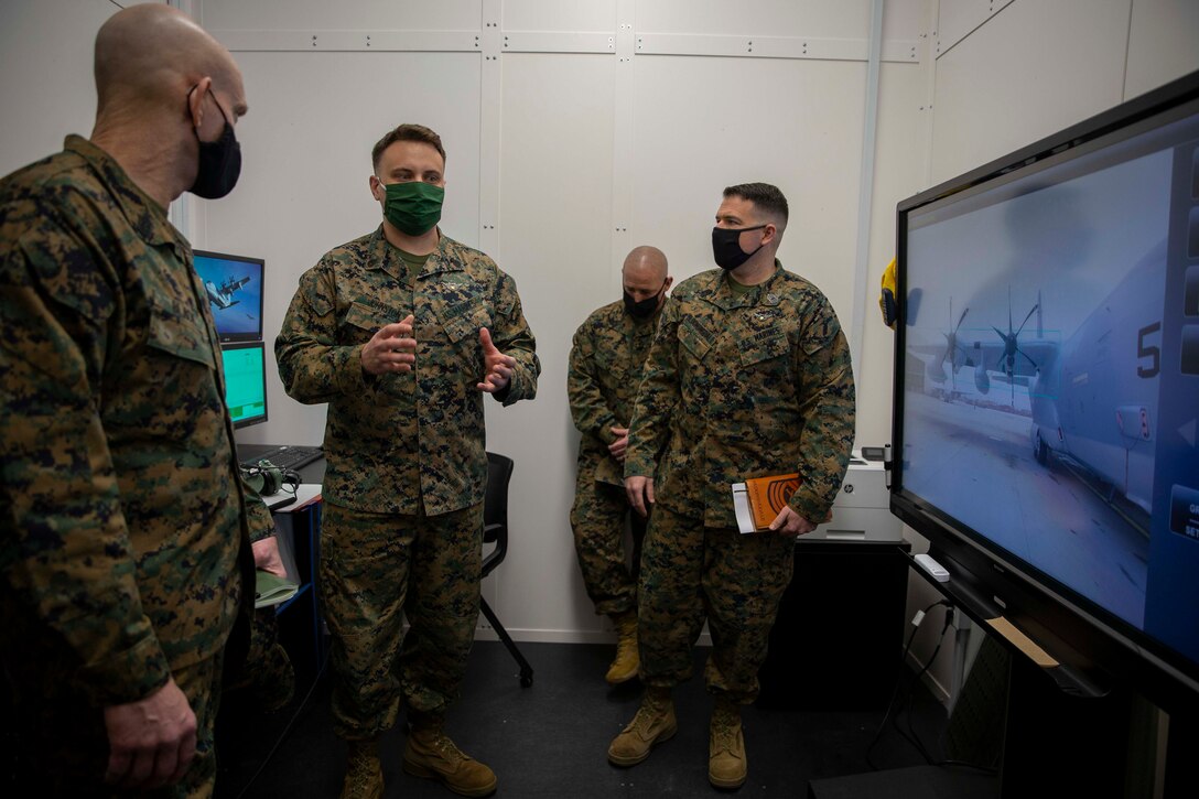 The 19th Sergeant Major of the Marine Corps, Sgt. Maj. Troy E. Black, tours the Center for Naval Aviation Technical Training (CNATT) at Marine Corps Air Station Cherry Point, Nc, Feb. 17, 2021. The Sergeant Major of the Marine Corps conducted the visit to look at the live virtual constructive training implemented at CNATT. The CNATT mission is to develop, deliver, and support aviation training necessary to meet validated fleet requirements through a continuum of professional and personal growth for Sailors and Marines. (U.S. Marine Corps photo by Sgt. Victoria Ross)