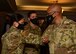 Air Force Chief of Staff Gen. Brown bumps elbows with an Airmen at Davis-Monthan AFB