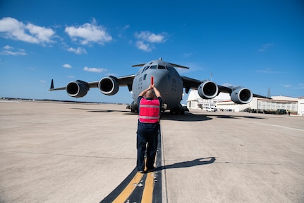 A U.S. Air Force C-17 from the 16th Airlift Squadron, Joint Base Charleston, S.C., arrives carrying over 57,000 bottles of water, Feb. 21 at Joint Base San Antonio-Kelly Field, JBSA provided emergency response assistance to local officials and agencies in order to ensure the safety and security of the community during and after the severe winter storm.