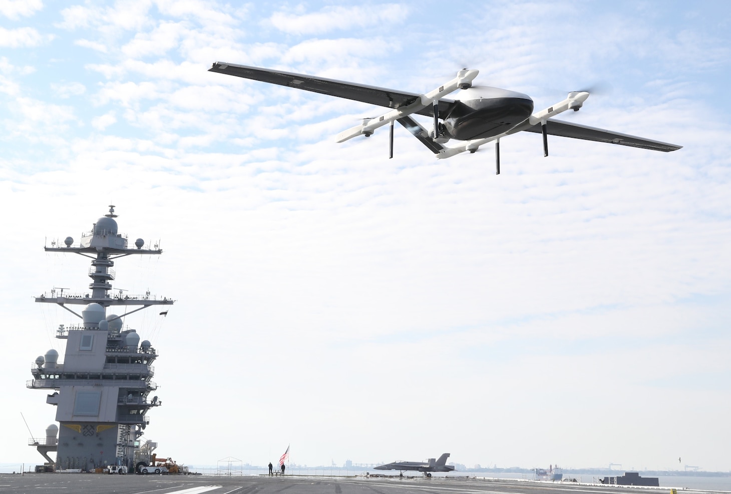 Unmanned Air System (UAS) prototype, called Blue Water UAS, approaches to deliver cargo on USS Gerald R. Ford’s (CVN 78) flight deck