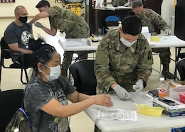 Caregivers at the Camp Arifjan, Kuwait hospital administered second-dose vaccinations Feb. 15, 2021 and Feb. 17, 2021 to civilian and military medical professionals. The first phase of the COVID-19 vaccination rollout in the Middle East area of operations focused on medical professionals, which follows the Department of Defense’s distribution guidance.