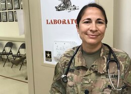 Lt. Col. Anisa Garcia, the assistant deputy director of clinical services at Camp Arifjan, Kuwait hospital supervised the post-vaccination observation station for the Feb. 15, 2021 and Feb. 17, 2021 second-dose COVID-19 vaccination of civilian and military medical professionals. Garcia said some vaccination recipients may experience some itching, a rash or some minor body aches, but it is nothing that cannot be handled by over-the-counter medications.