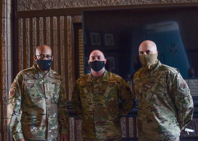 Air Force Chief of Staff, Gen. Charles Q. Brown, Jr. takes a photo with Airmen at Davis-Monthan Air Force Base.