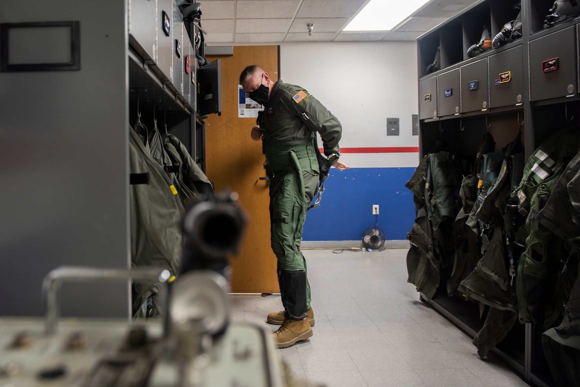 Maj. Gen. William Spangenthal, Air Education and Training Command deputy commander, gears up before taking flight at Laughlin Air Force Base, Texas, Feb 9, 2021. After six weeks of academics, student pilots then become familiar with their first aircraft, the T-6 Texan II, learning basic flying skills and advanced aerobatics. (U.S. Air Force photo by Airman 1st Class David Phaff)