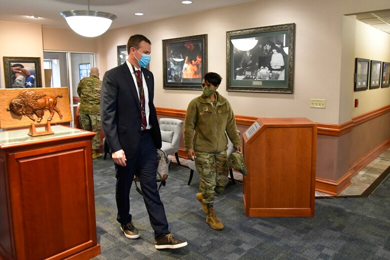 Utah Rep. Blake Moore (left) is greeted by Col. Jenise Carroll, 75th Air Base Wing commander, during a visit to Hill Air Force Base, Utah, Feb. 16, 2021.