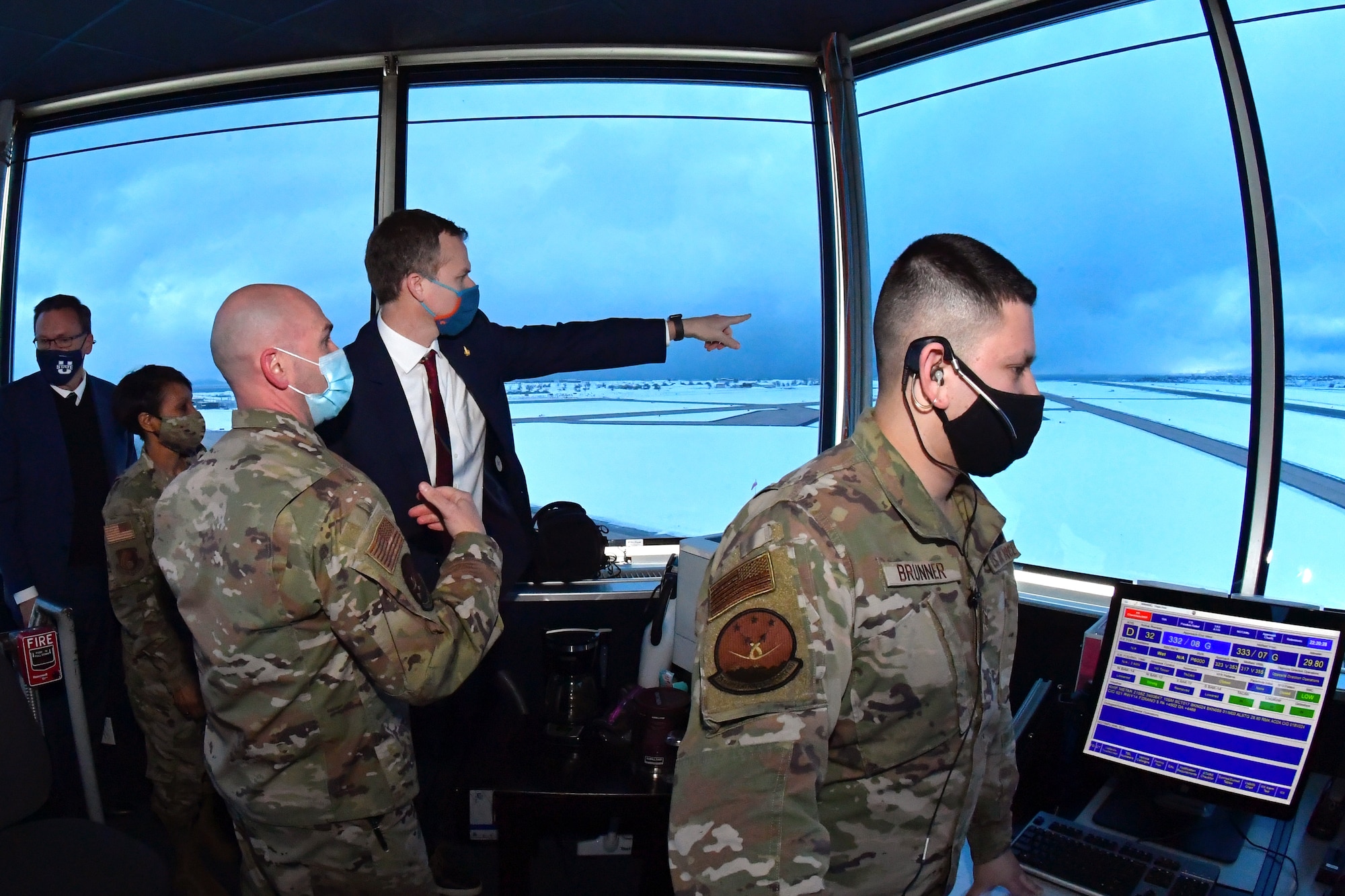 Lt. Col. Joseph Michaels (center), 75th Operations Support Squadron commander, explains air traffic control operations to Utah Rep. Blake Moore and Hill leadership during a visit to the air traffic control tower at Hill Air Force Base, Utah, Feb. 16, 2021.