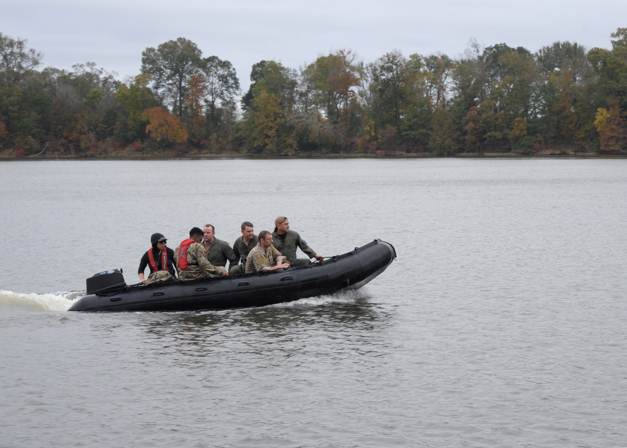Members of the 908th Operations Group rides in a F470 Combat Rubber Raiding Craft after meeting at their designated extraction point Nov. 8, 2020, at Maxwell Air Force Base, Alabama.