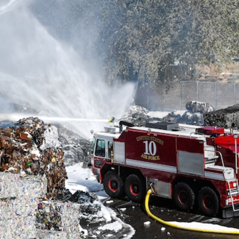 Firefighters from Kirtland Air Force Base, New Mexico, respond to a fire in Albuquerque.