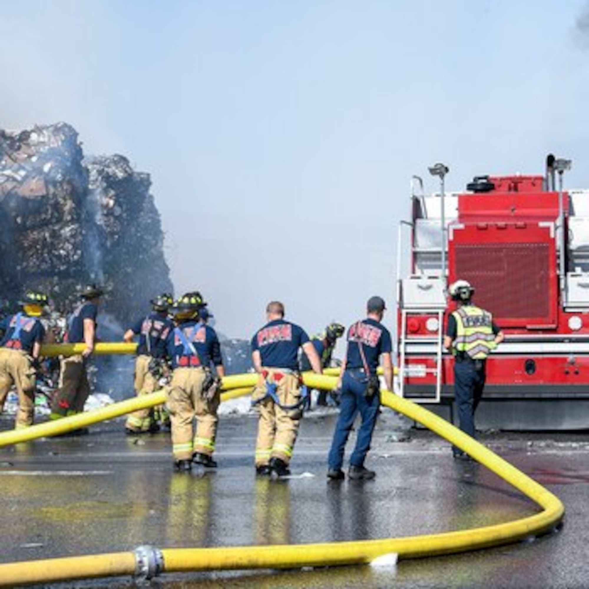 Firefighters from Kirtland Air Force Base, New Mexico, respond to a fire in Albuquerque.