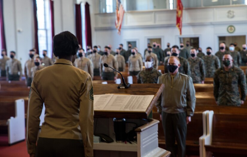 Marines stand at attention for “Anchors Aweigh” during graduation ceremony for Lance Corporal Leadership and Ethics Seminar, Class 1-21, at Marine Corps Air Station, Cherry Point, North Carolina, January 28, 2021 (U.S. Marine Corps/Michael Neuenhoff)