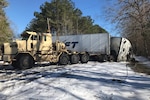 The Louisiana National Guard has been clearing snow and debris from roads in three parishes following a winter storm last week. Guard members also helped Louisiana State Police and transportation officials clear Interstate 20, moving 260 disabled commercial vehicles, Feb. 22, 2021.
