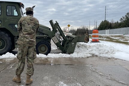 More than 1,200 members of the Louisiana National Guard assisted state officials responding to a winter storm. Guardsmen helped clear roads and move disabled vehicles Feb. 22, 2021.