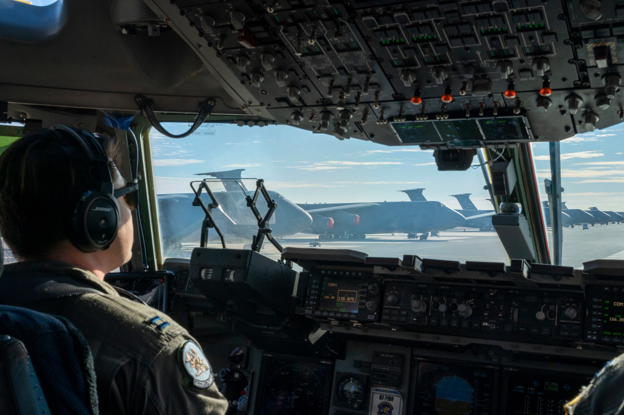 Capt. Brandon Riley, 326th Airlift Squadron pilot, taxis a C-17 Globemaster III prior to takeoff during the Liberty Eagle Readiness Exercise at Dover Air Force Base, Delaware, Feb. 17, 2021. The exercise evaluated Team Dover’s ability to rapidly deploy Airmen, Guardians and equipment with limited notice. (U.S. Air Force photo by Airman First Class Cydney Lee)