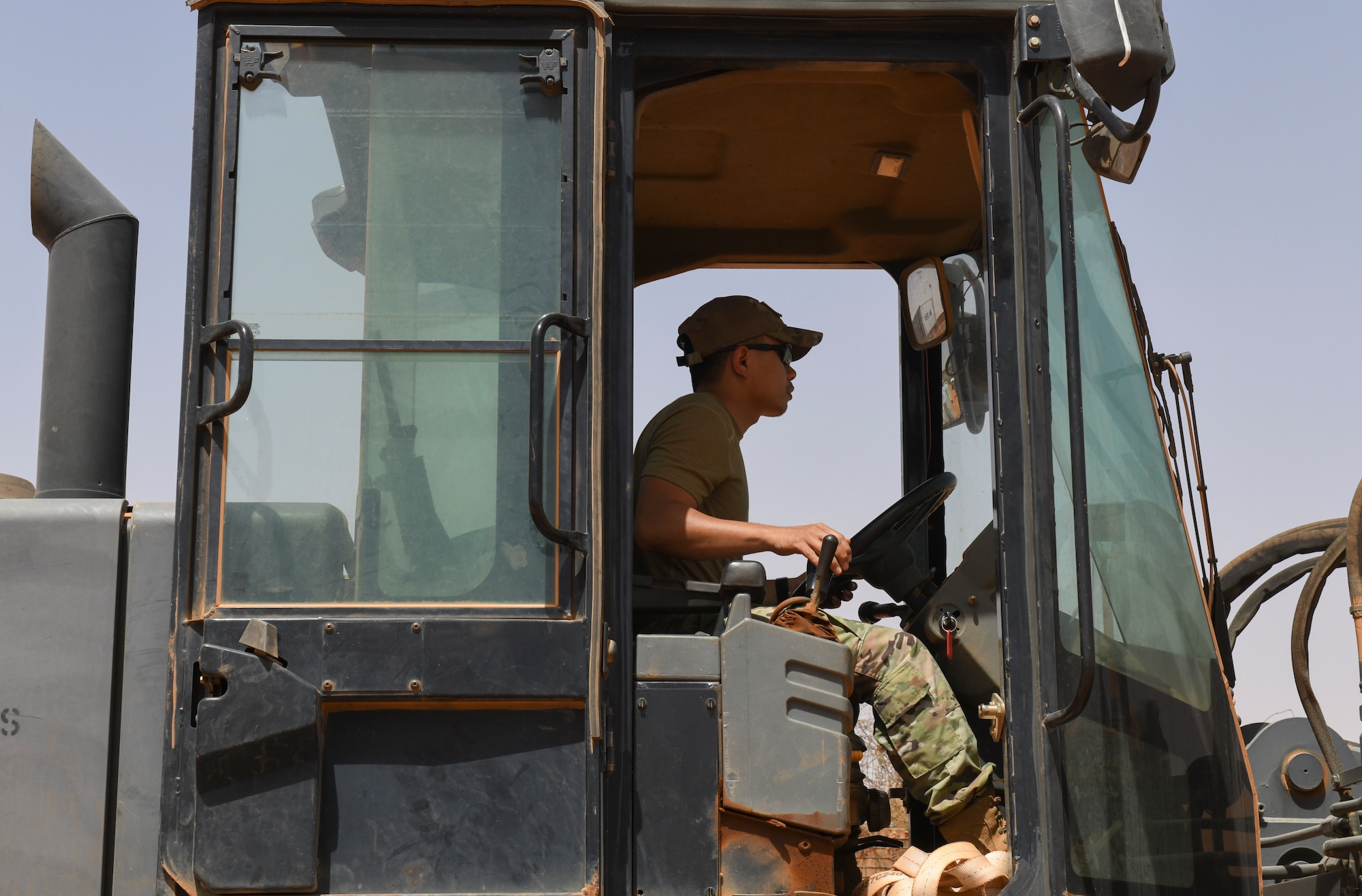 U.S. Air Force Senior Airman Ruben Tala, 768th Expeditionary Air Base Squadron dining facility and storeroom manager, operates a forklift to move pallets of water that were shipped to Nigerien Air Base 101, Niamey, Niger, Feb. 16, 2021.