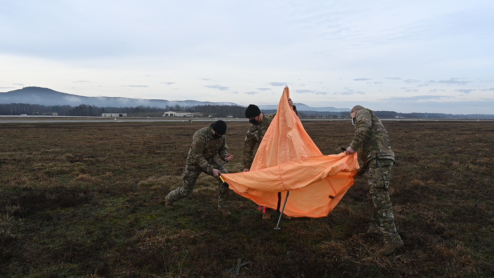 U.S. Air Force Airmen from the 37th AS, 86th Operations Support Squadron, 435th Contingency Response Group and U.S. Army Soldiers from the 5th Quartermaster Company worked together to make the personnel airdrop possible.