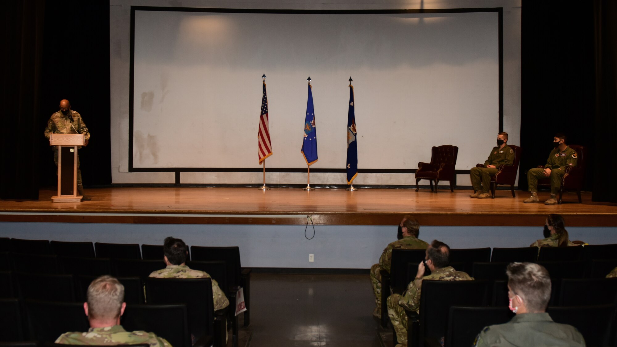 A photo of Air Force Chief of Staff on stage with recipients of the 2019 MacKay trophy for most meritorious flight.