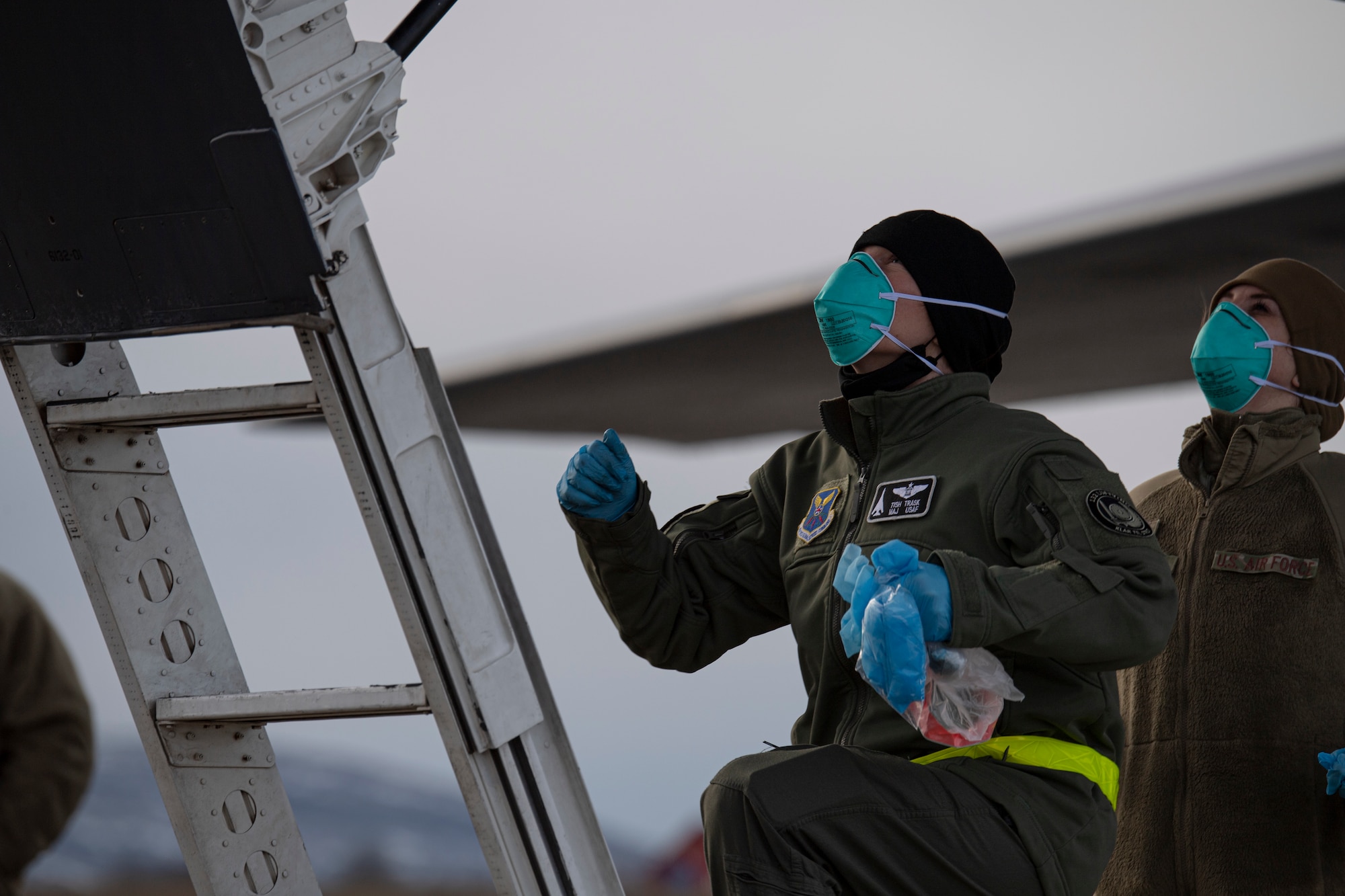 Airmen assigned to the 9th Expeditionary Bomb Squadron prepare to sanitize the cockpit of a B-1B Lancer at Ørland Air Force Station, Norway, Feb. 22, 2021. The 9th EBS underwent a variety of  COVID-19 preventative measures in order to be in compliance with both host nation and Department of Defense requirements. (U.S. Air Force photo by Airman 1st Class Colin Hollowell)