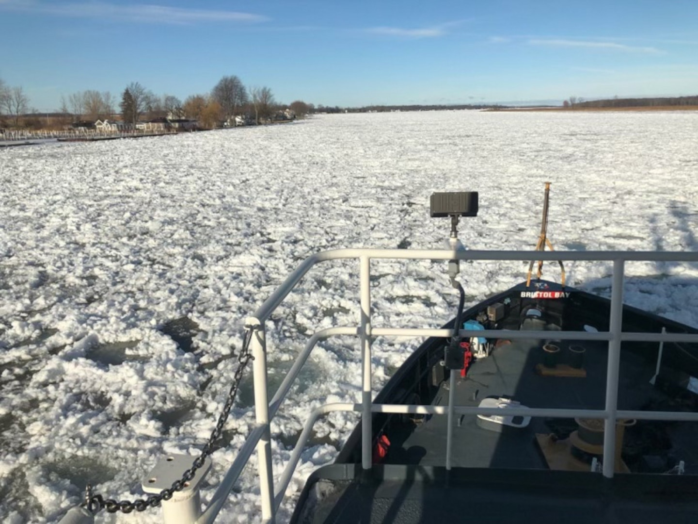 Coast Guard Cutter Morro Bay cuts through ice on February 10, 2021 on the St. Clair River in support of Operation Coal Shovel. Operation Coal Shovel is an annual domestic ice-breaking mission conducted on Lakes Huron, Ontario, Erie, St. Clair, the St. Clair/Detroit river system and St. Lawrence Seaway.

 Courtesy photo by Gary Baumgarten.