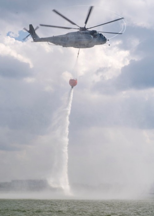 Helicopter dropping water