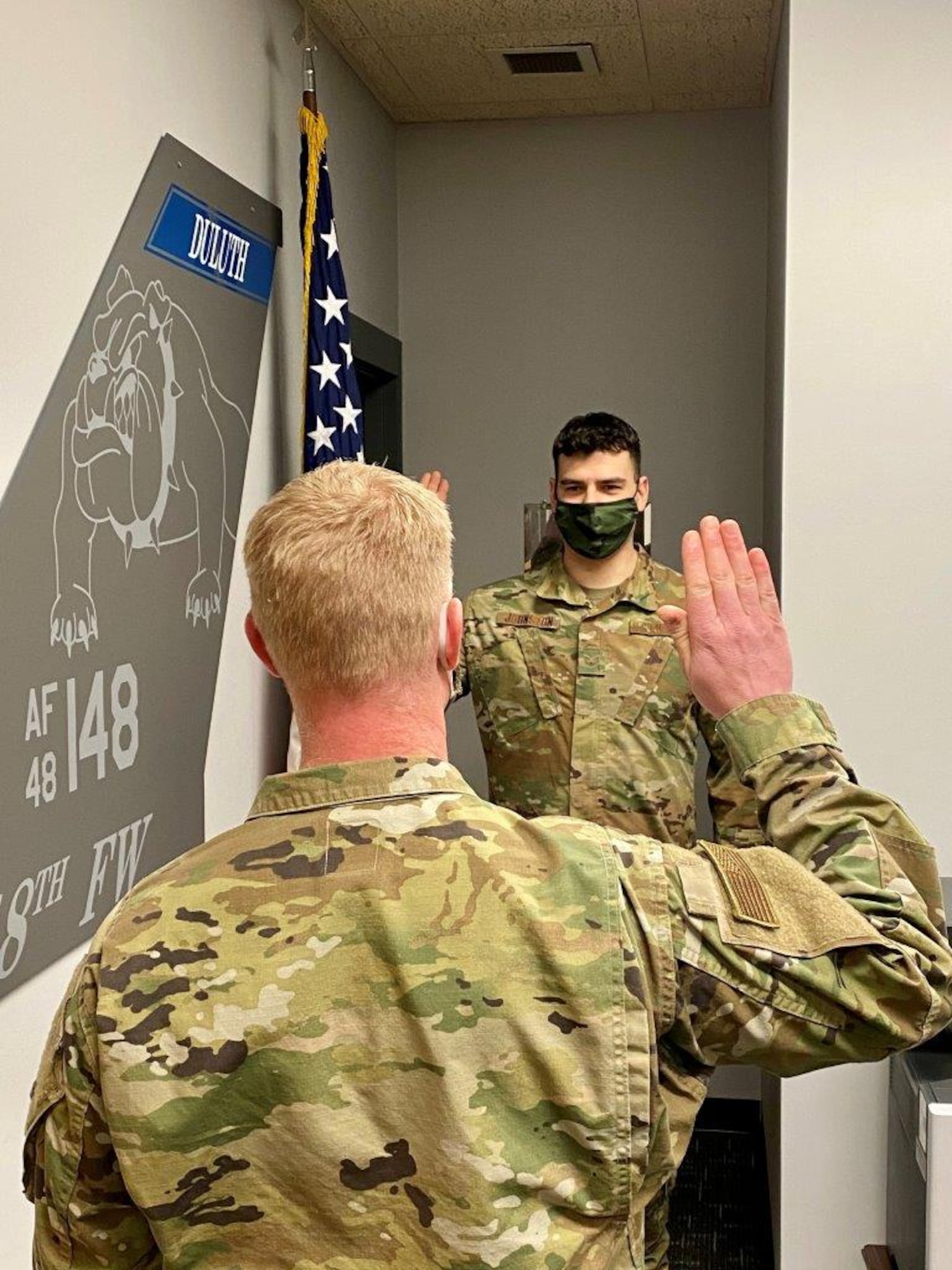 148th Fighter Wing Aircraft Metals Technician, Tech. Sgt. Jason Johnston, takes the Oath of Office during his reenlistment on Feb. 2, 2021.  (U.S. Air National Guard photo by Audra Flanagan)