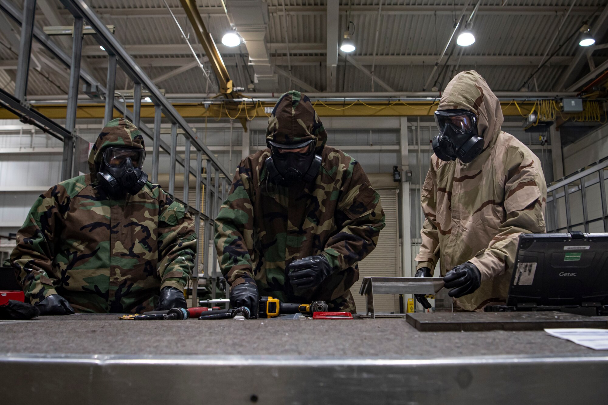 Photo of Airmen preparing for task qualification training.