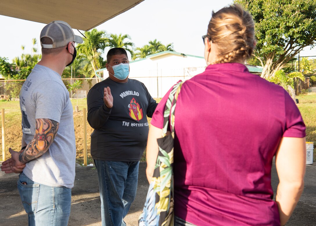 The Honorable Allan Ungacta, Mangilao mayor, speaks with Lt. Col. Rebecca Heyse, 36th Force Support Squadron commander, during a beautification event at Latte Heights Park, Mangilao, Guam, Jan. 30, 2021.