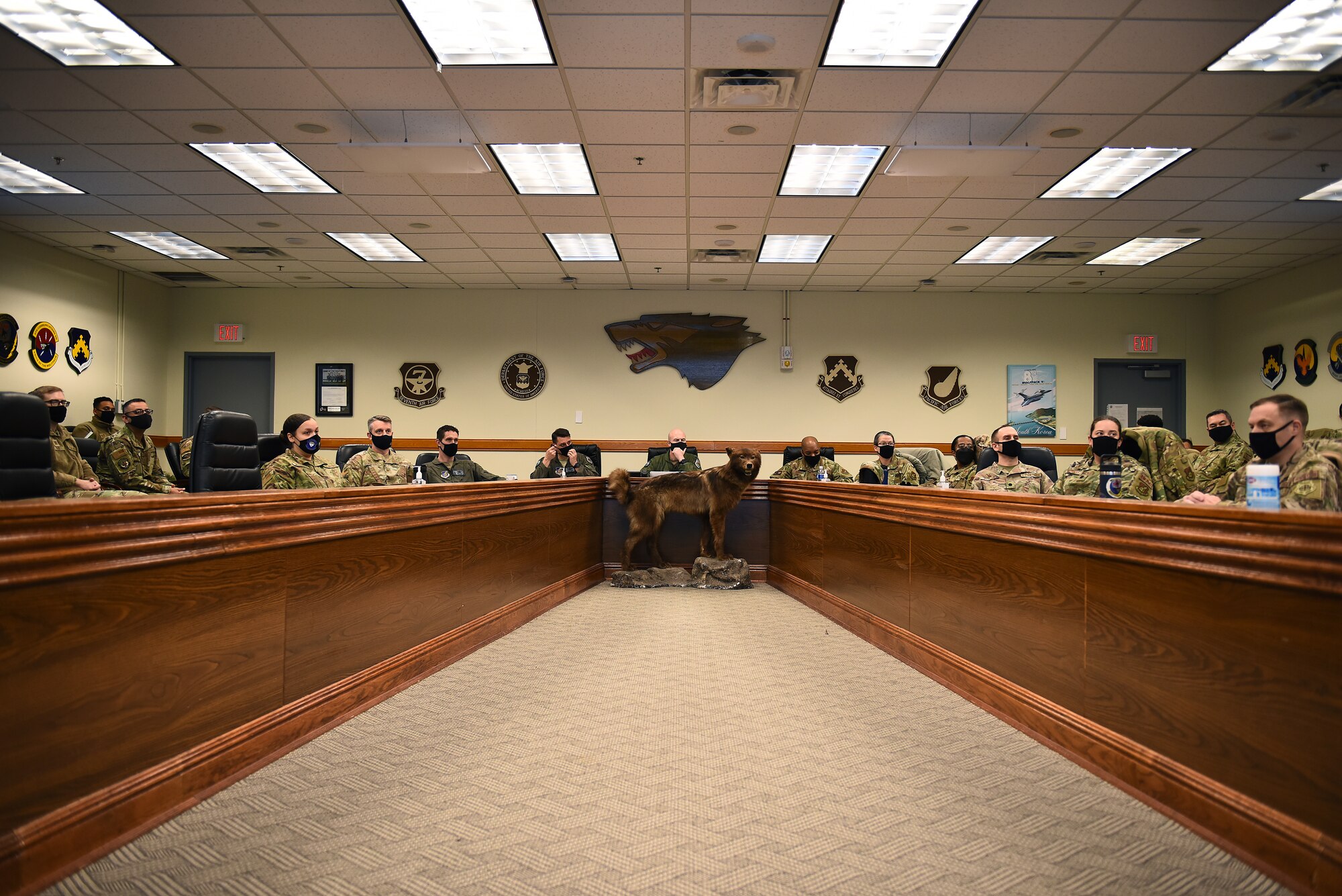 Wing leadership and audience members discuss an innovative idea presented during a Wolf Tank in the 8th Fighter Wing conference room at Kunsan Air Base, Republic of Korea, Feb. 17, 2021. Wolf Tank is based on the TV show “Shark Tank,” and is part of the wing’s Operation BOLO program, which stands for “Be on the Lookout for Opportunity.” Operation BOLO gives Airmen the opportunity to accelerate change and enhance the wing’s ability to accomplish the mission, year-round, with Wolf Tanks held periodically to put ideas into action. (U.S. Air Force photo by Senior Airman Suzie Plotnikov)