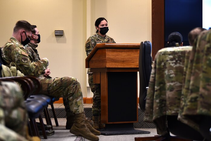 Capt. Suzanna Palmer, 8th Logistics Readiness Squadron vehicle management flight commander, briefs about exoskeleton bionic vests during a Wolf Tank in the 8th Fighter Wing conference room at Kunsan Air Base, Republic of Korea, Feb. 17, 2021. Wing leadership selected three of the five ideas to receive full or partial funding, including the fire pump panel simulator, 3D printers and exoskeleton bionic vests. (U.S. Air Force photo by Senior Airman Suzie Plotnikov)