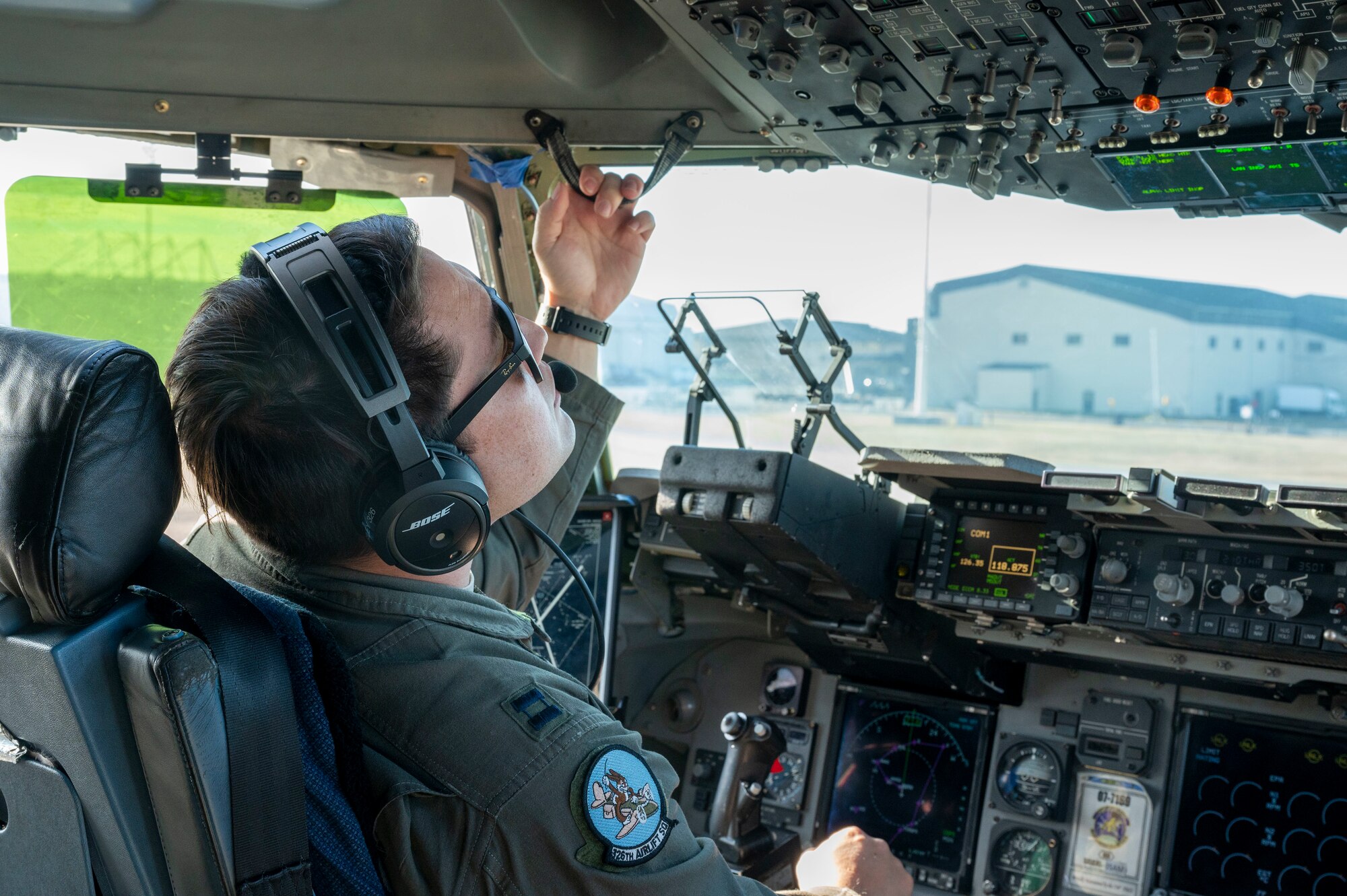Capt. Brandon Riley, 326th Airlift Squadron C-17 Globemaster III pilot, prepares for a local flight during the Liberty Eagle Readiness Exercise at Dover Air Force Base, Delaware, Feb. 17, 2021. The exercise evaluated Team Dover’s ability to rapidly deploy Airmen, Guardians and equipment with limited notice. (U.S. Air Force photo by Airman First Class Cydney Lee)