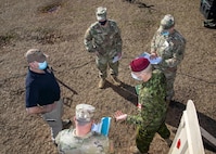 XVIII Airborne Corps Assistant Commanding General, Canadian Brig. Gen,. Robert Ritchie, right, and Joint Task Force Civil Support (JTF-CS) Deputy to the Commanding General Michael Collins meet with 20th Engineer Brigade leadership during a command post training exercise on Fort Bragg, N.C., Feb. 23, 2021.