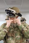 A Soldier dons the Integrated Visual Augmentation System (IVAS) Capability Set 3 (CS3) at the Soldier Integration Facility (SIF) at Fort Belvoir, VA in January 2021.