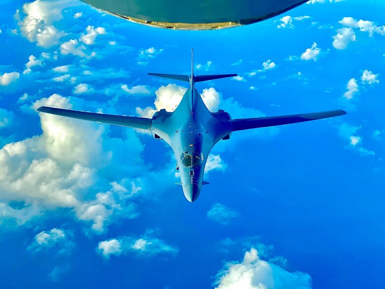 A U.S. Air Force B-1B Lancer aircraft assigned to the 7th Bomb Wing, Dyess Air Force Base, Texas, prepares to receive fuel from a KC-135 Stratotanker aircraft assigned to the 100th Air Refueling Wing, Royal Air Force Mildenhall, England, during a Bomber Task Force Europe mission, Feb. 22, 2021. Strategic bomber missions familiarize aircrew with air bases and operations in different geographic combatant commands’ areas of operation. (Courtesy photo by Staff Sgt. Blake Soule)